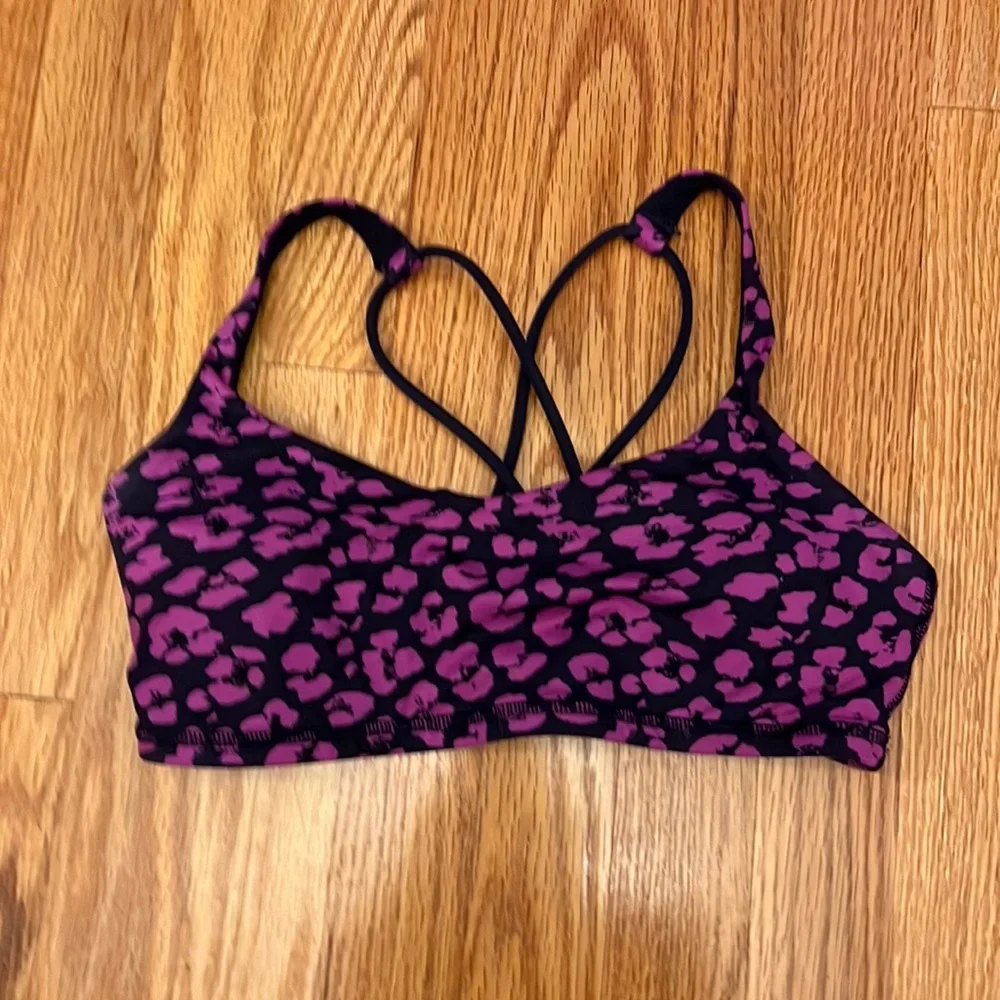 Lululemon Free To Be Black Crisscross Strap Sports bra with fuchsia flower print
